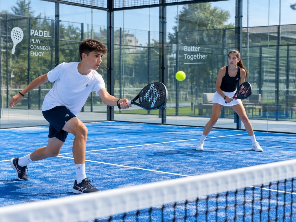 Juniors playing padel